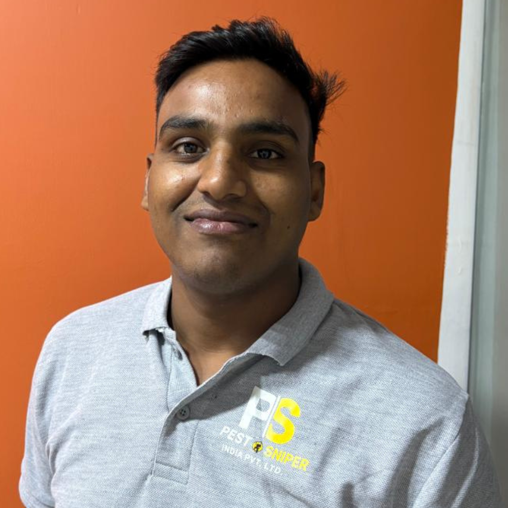 Portrait of Michael Lee, Operations Manager, a friendly man with short hair wearing a collared shirt